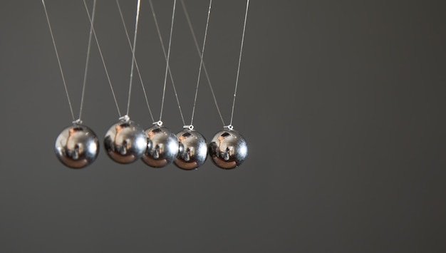 Newton's cradle balls Space for your text