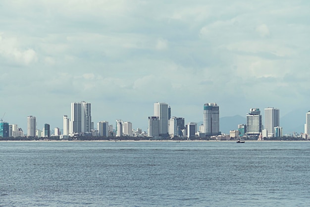 Nha Trang City view from the sea with mountain background.