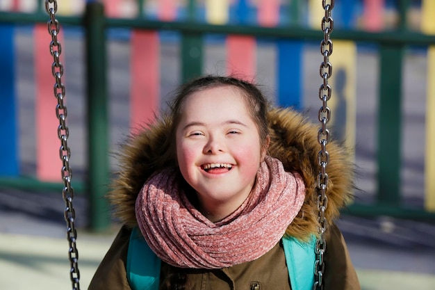 Nice girl having fun on the playgound