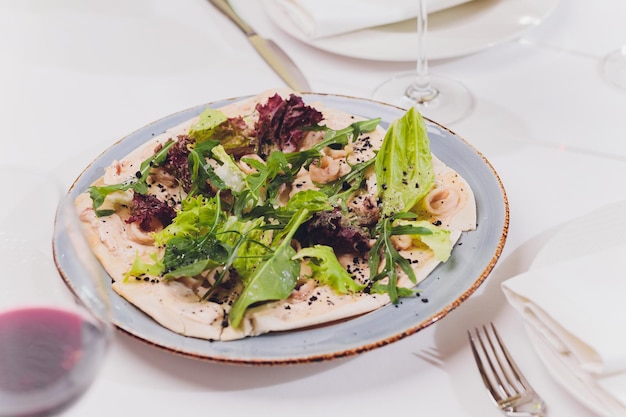 Nicoise Salad served in a restaurant in Cannes France Horizontal tilted view