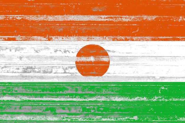 Niger flag painted on a rustic old metal sheet