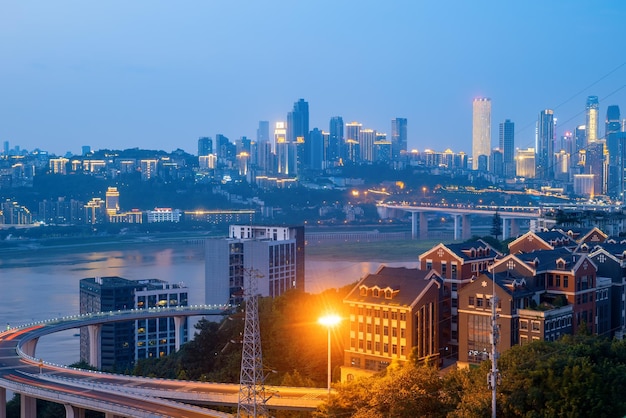 At night the circular overpass and the urban skyline are in Chongqing China