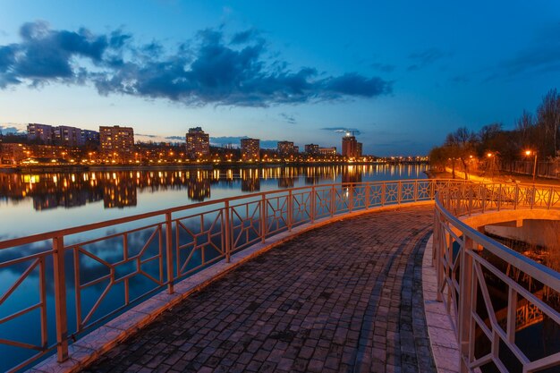 Night city reflection on the river