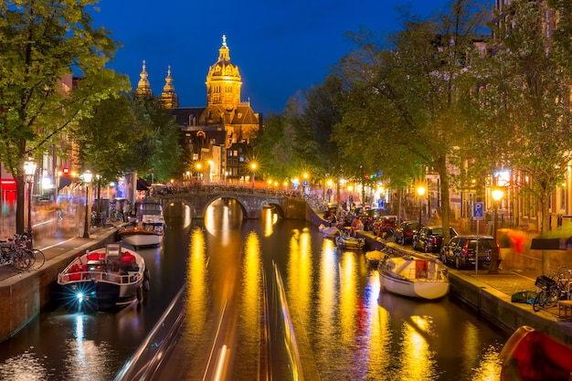 Night redlight district and Basilica of Saint Nicholas Amsterdam Holland Netherlands