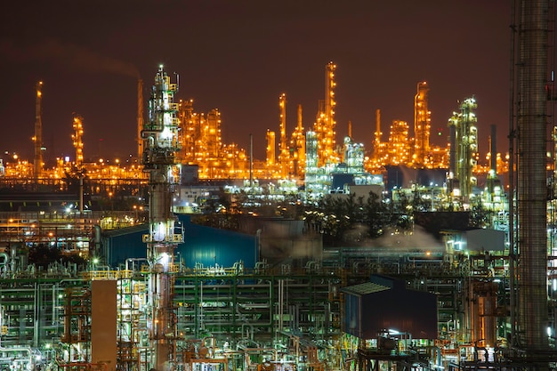 Night scene of oil refinery plant and power plant of Petrochemistry industry.