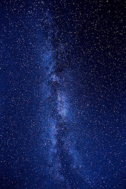 Night sky in mountains. Milky way. Millions stars 