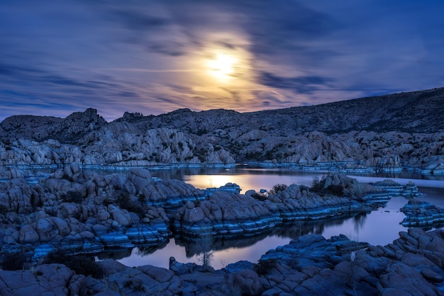 Night sky with full moon above Watson Lake in Prescott Arizona