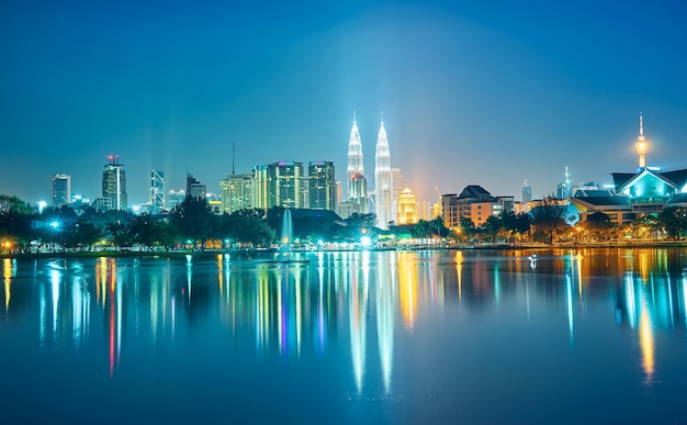 Night view of Kuala Lumpur city with stunning reflection in water