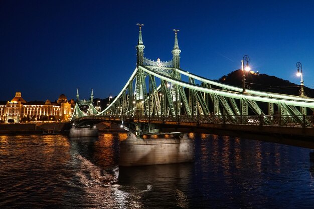 Night view of a Liberty bridge Szabadsag hid over the Danube river in BudapestHungary