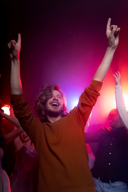 Nightlife with people dancing in a club