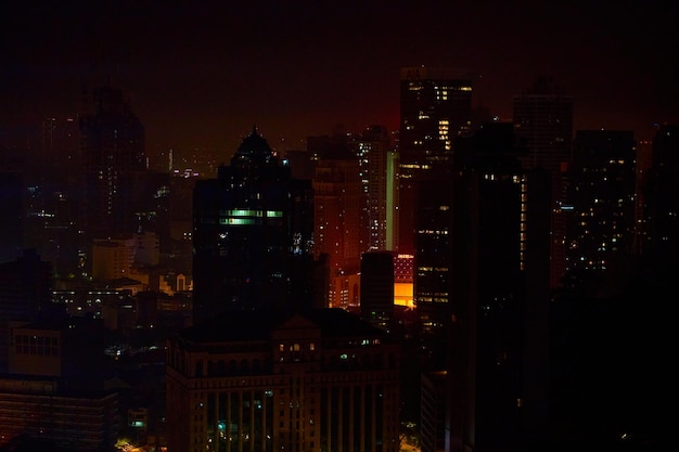 A nighttime cityscape Night time illumination of a big city panorama Top view from the drone