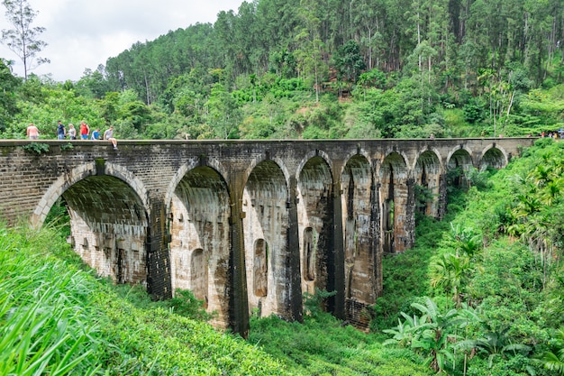 Nine Arched Bridge located in the deep jungle in cloudy weather