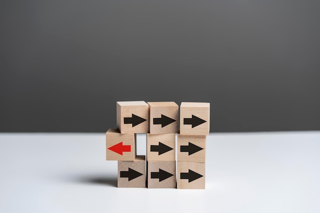 The nine wooden cubes with arrows unique concept arrow change direction