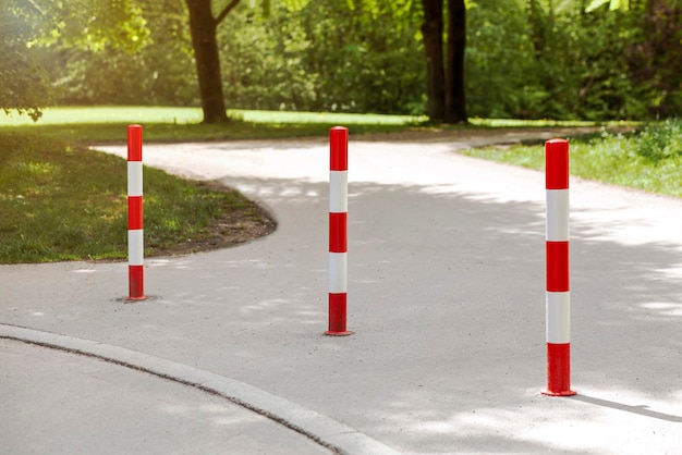 No entry for Cars or Auto. Traffic poles Bollards on Park, Entrance to Walking Area for Pedestrians 