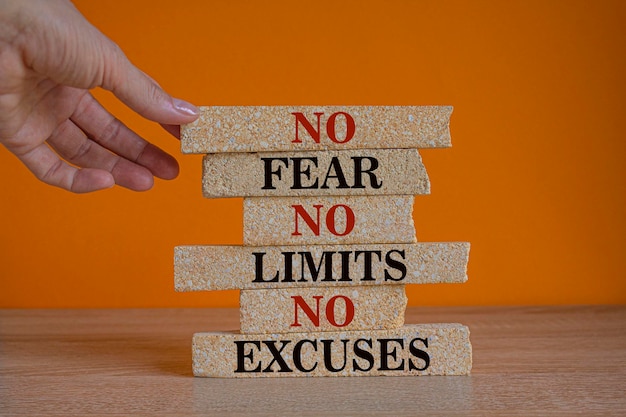 No fear limits excuses symbol Concept words No fear no limits no excuses on brick blocks