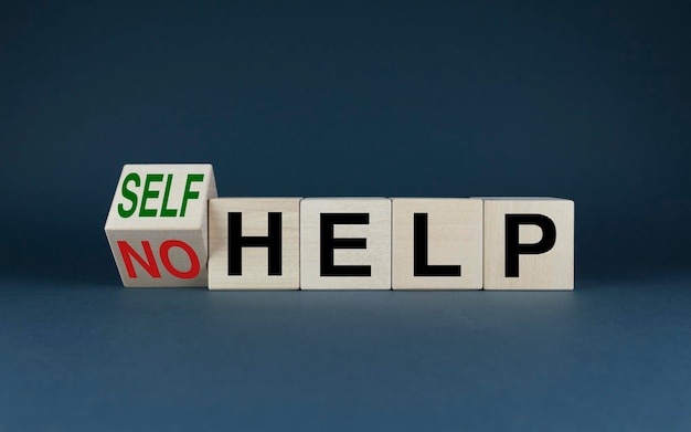 No help or self help Cubes form words No help or self help Support concept