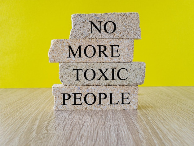 No more toxic people symbol Concept words No more toxic people on brick blocks