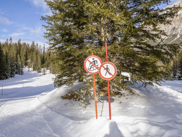 No snowshoes people pass on dolomites snow panorama val badia armentarola