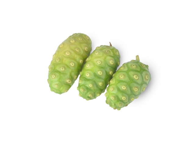 Noni or Morinda Citrifolia fruits with half slice isolated on white