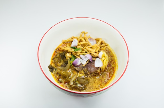 Noodle Khao Soi thai food style on white backgroundfood style Northern Thailand