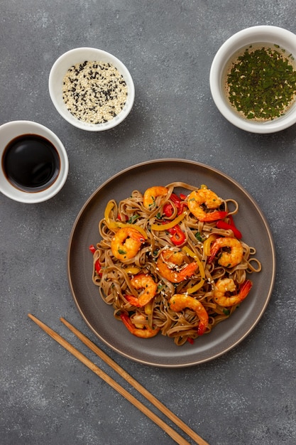 Noodles with shrimps, pepper and soy sauce.