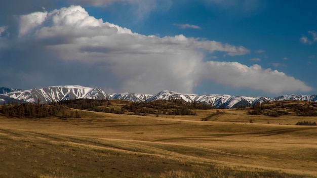 North Chuya Ridge Evening sky with beautiful clouds Kurai steppe Altai Mountains Russia