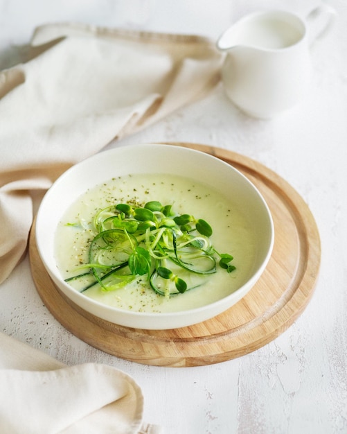 Northern cuisine Vegetable puree soup Green cream soup with microgreenery Nordic style food