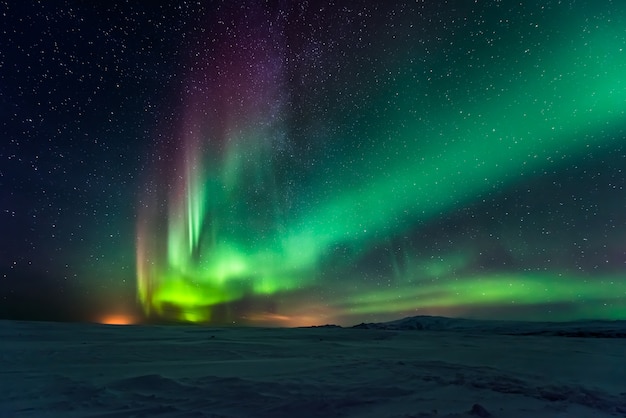 Northern lights aurora borealis over mountains