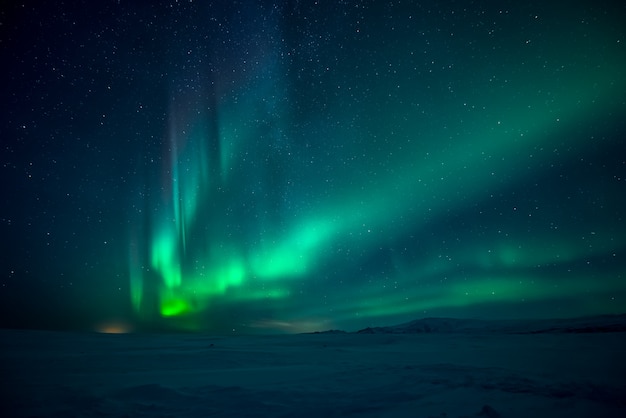 Northern lights aurora borealis over mountains