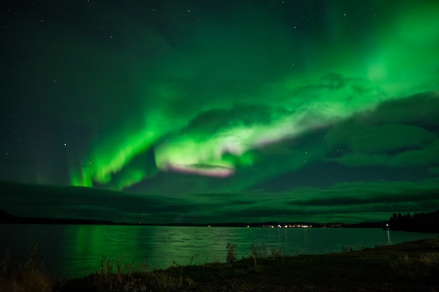 Northern lights above a lake in Sweden