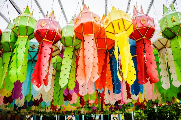 Northern thai style paper lamp lighting hanging under sunlight