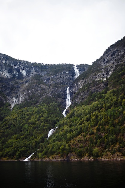 Norway landscape with big waterfall Picturesque landscape mountains of Norway Travelling