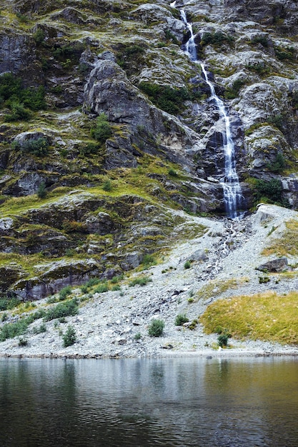 Norway landscape with big waterfall Picturesque landscape mountains of Norway Travelling