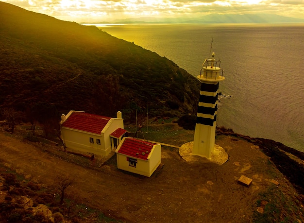 Nostalgic lighthouse at amazing sunset Karaburun Izmir Turkiye