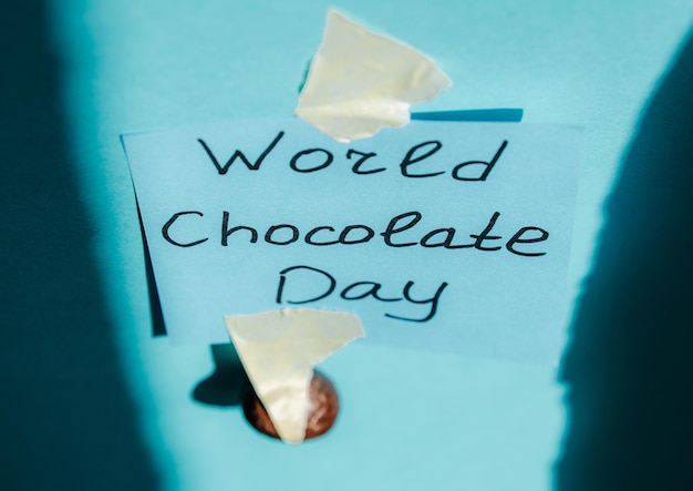 Photo note paper world day chocolate with eggs candy