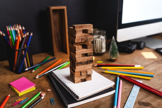 notebook and crayons on the desk