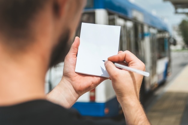 notebook in a man's hand