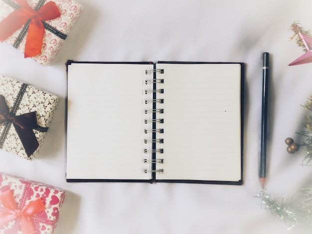 Notebook and pencil with gift box Christmas