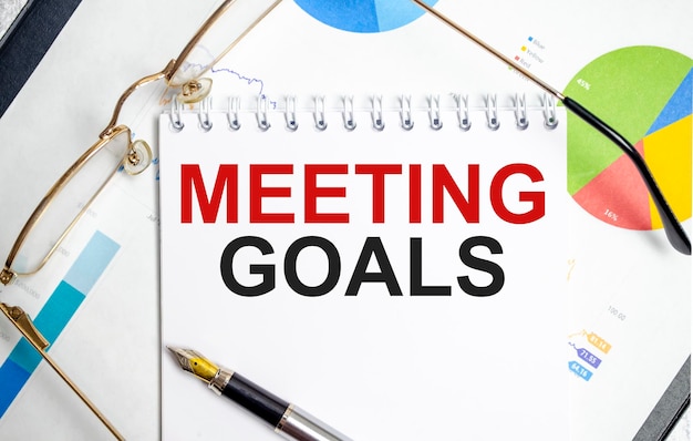 Notebook with Tools and Notes with text MEETING GOALS