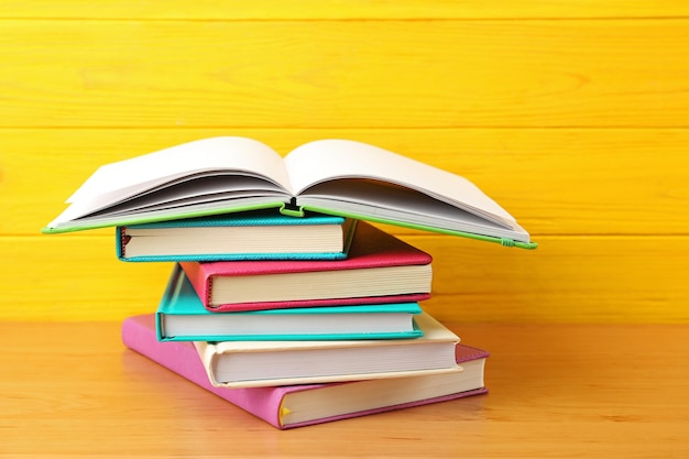 Notebooks on wooden background