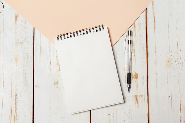 Notepad on the wooden desk table