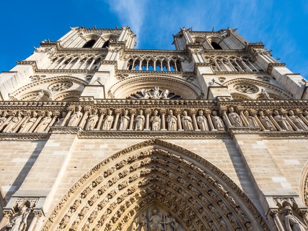 Notre dame cathedral is landmark of Paris France under blue sky