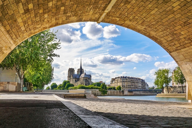 Notre Dame de Paris Cathedral on beautiful sky and cloud.