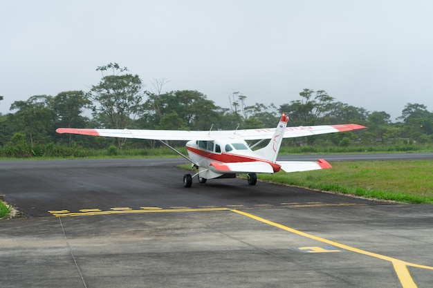 Nov 4 2021, Shell, Pastaza, Ecuador. Light Aircraft on small runway in the Amazon Region of Ecuador