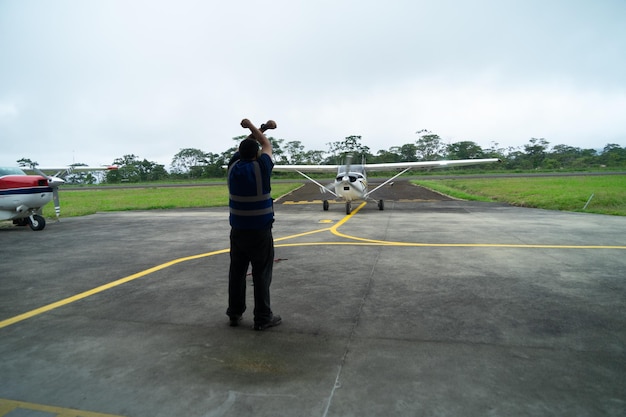 Nov 4 2021, Shell, Pastaza, Ecuador. Mechanics working on a light aircraft in the Amazon Region of Ecuador