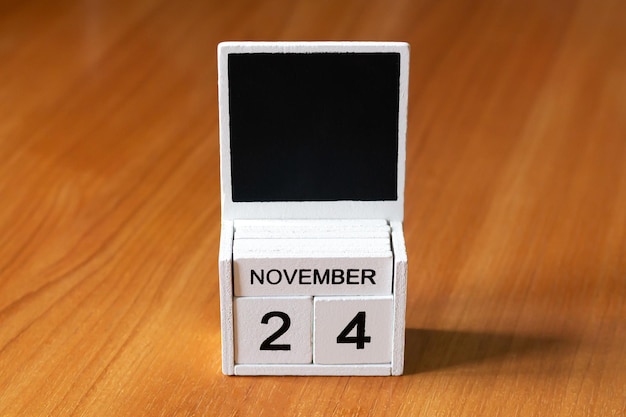 November 24 calendar date text on desk