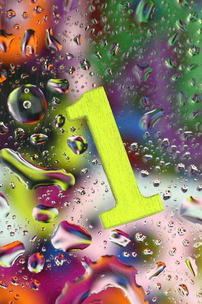 Number one on abstract colorful drops background