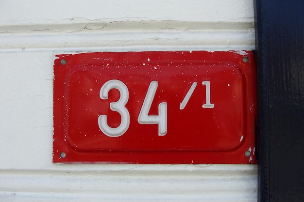 Photo number plate on wall