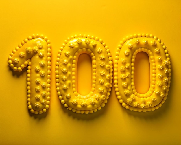 a number written in yellow with numbers that say 100