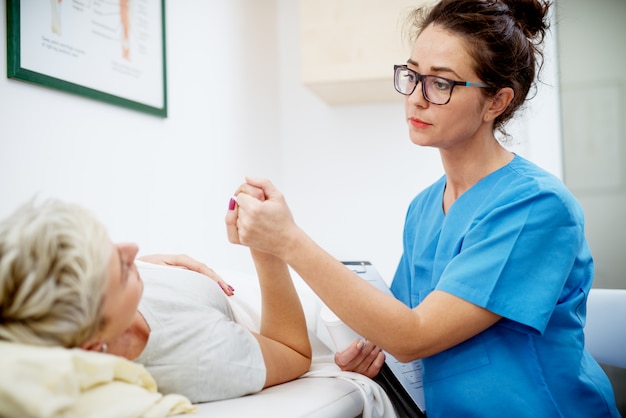 Nurse calming her patient.